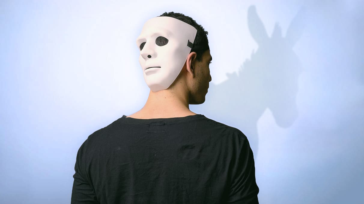 Man with a mask to trick